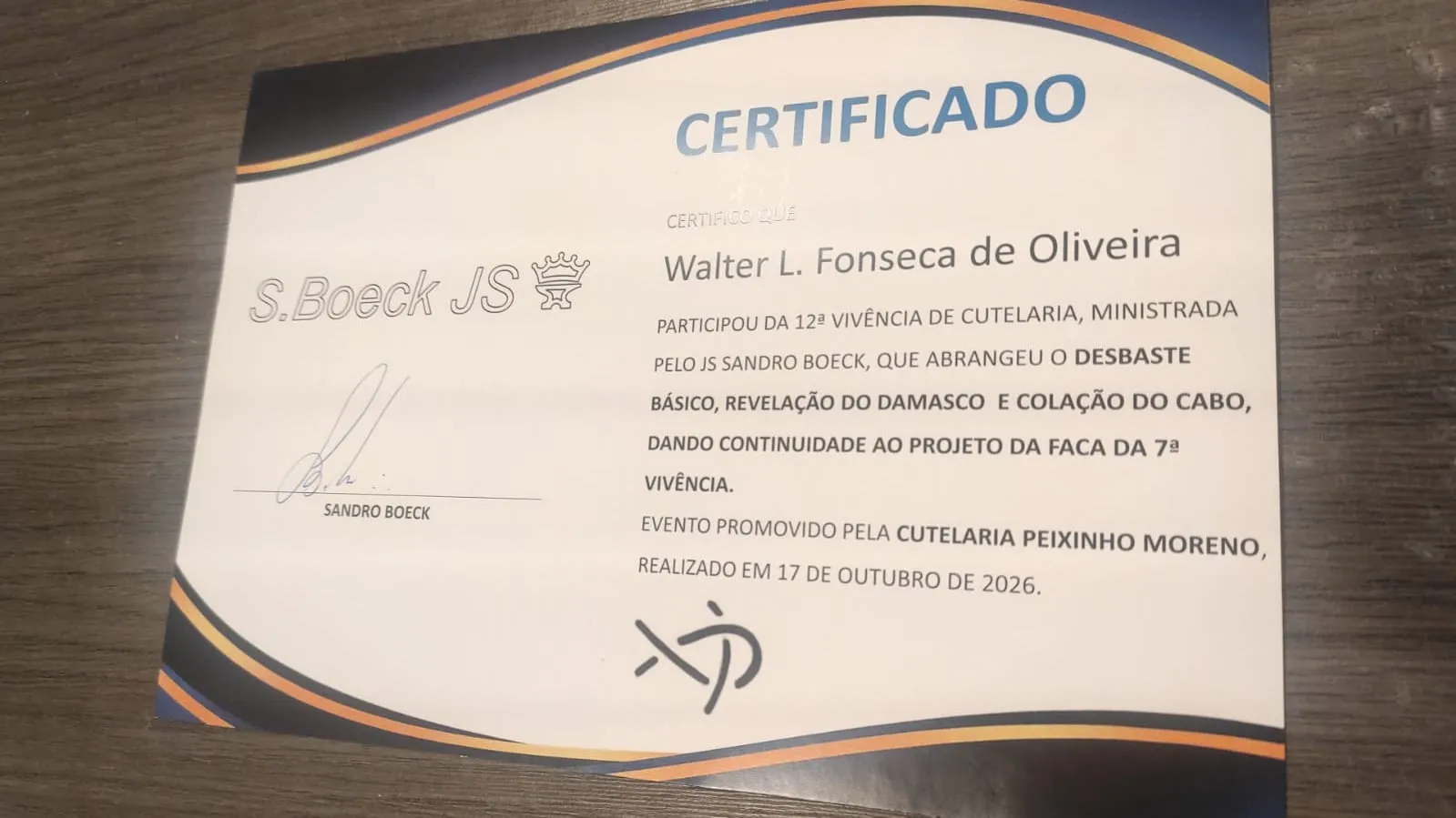 Certificado da 12ª Vivência de Cutelaria em nome de Walter L. Fonseca de Oliveira, com a assinatura de Sandro Boeck e a data de 17 de outubro de 2026.